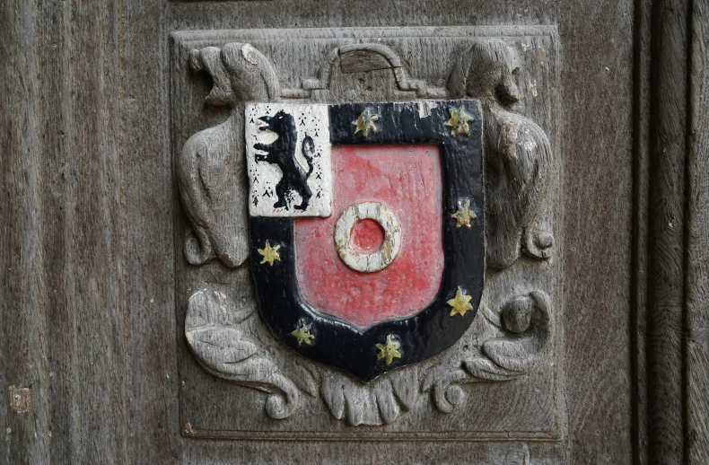 this coat of arms and lions emblem is decorated