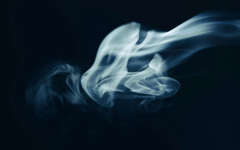 the dark image shows smoke coming from the bottom of the smoke