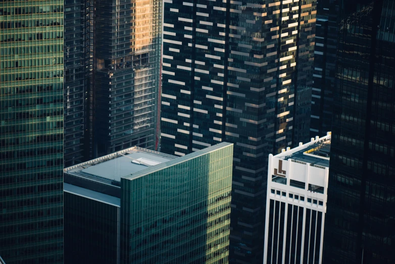 a bunch of tall buildings with many windows