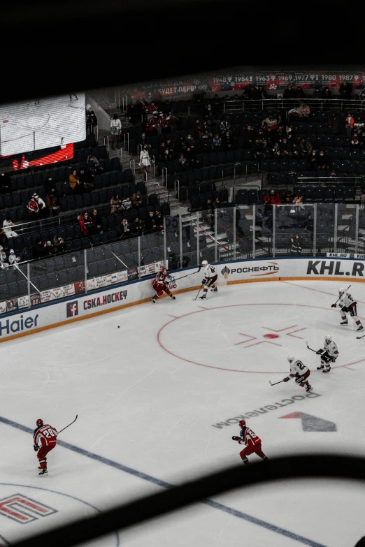 an ice hockey game is on at a stadium