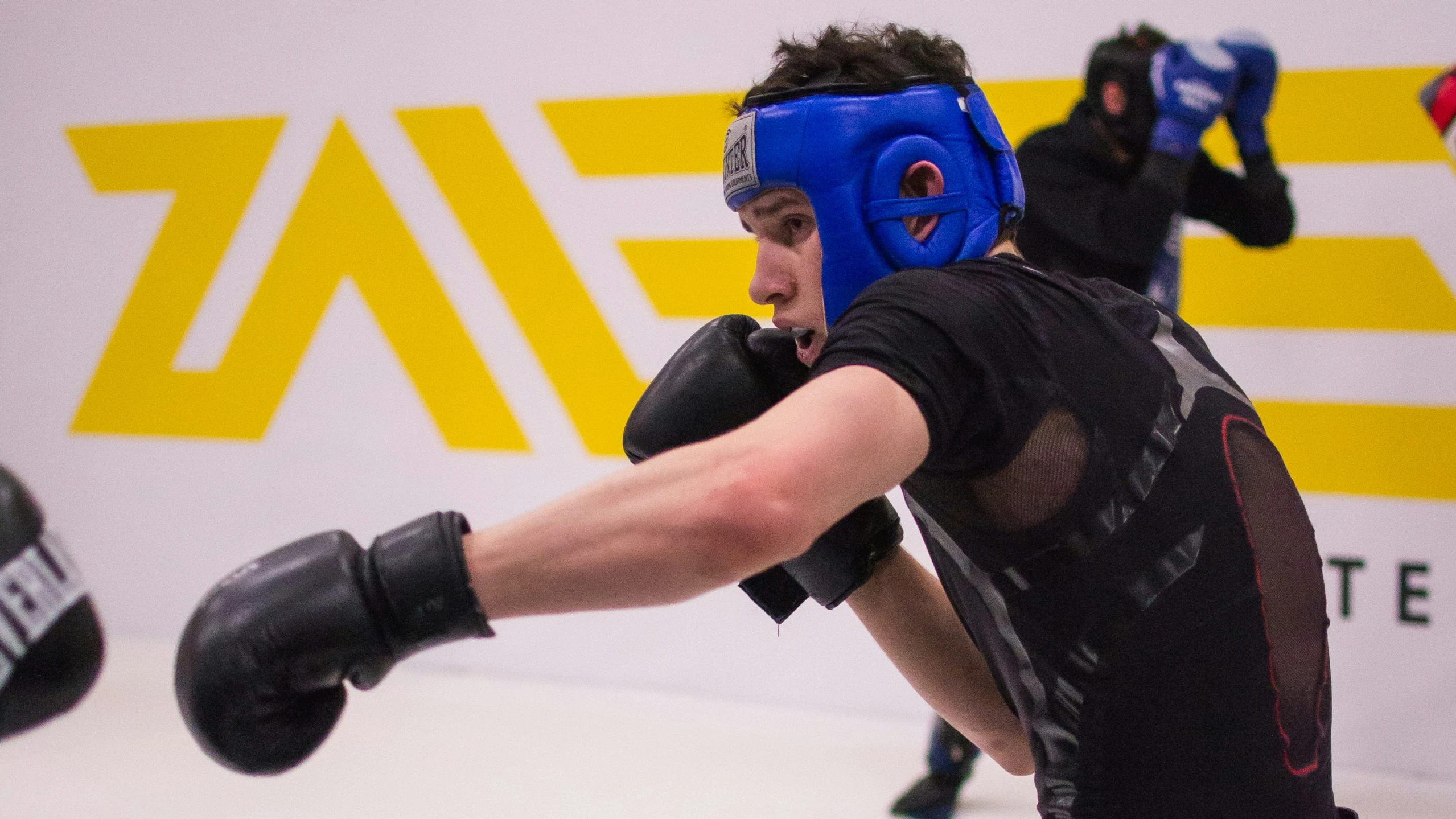 a couple of men fighting in an arena