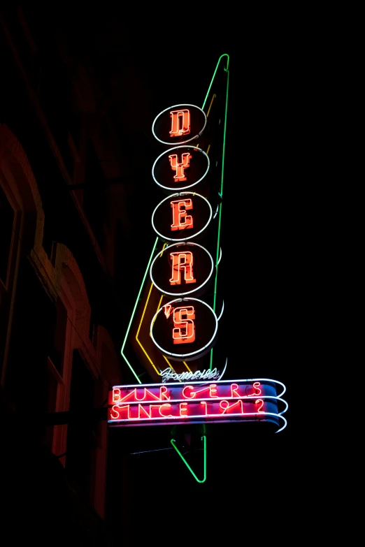 a street sign and some very interesting lights