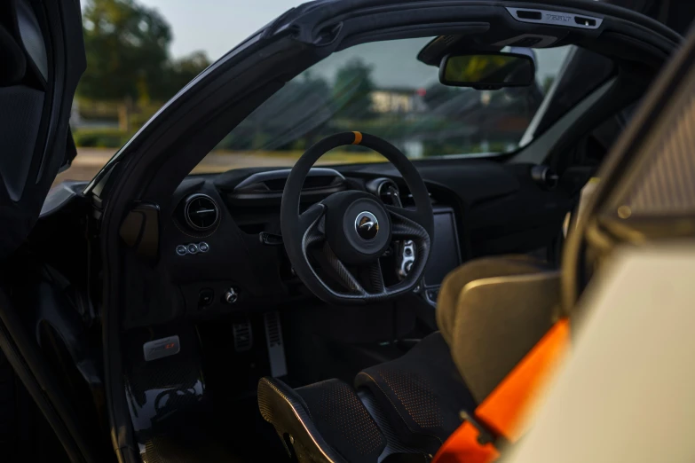 there is an interior view of a car in the street