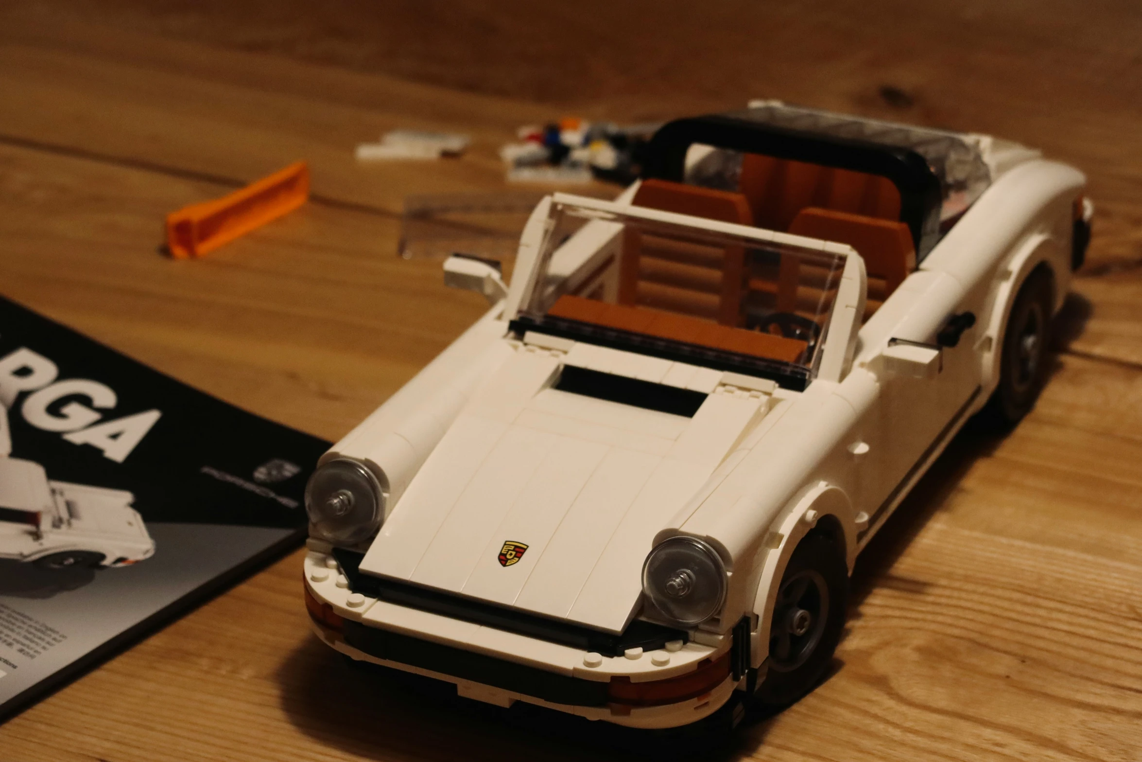 an extremely detailed model of a sports car is on display