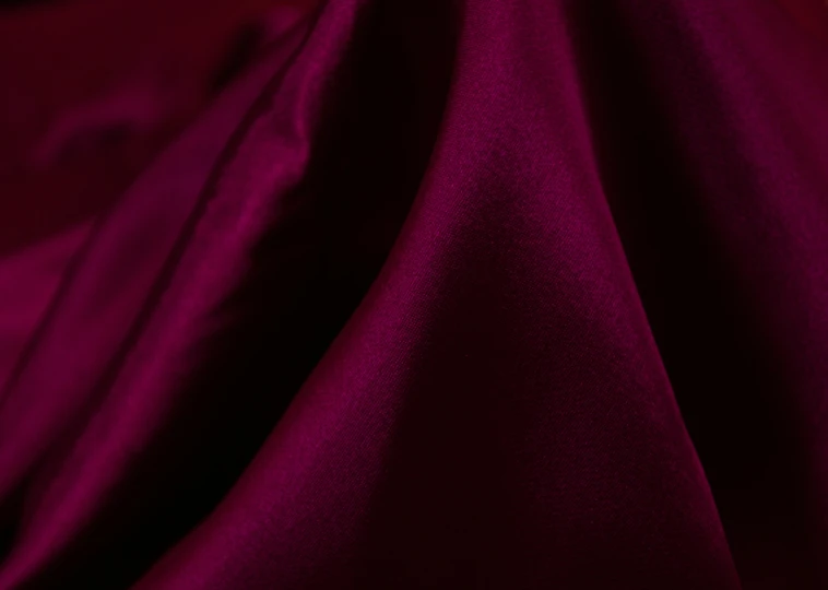 dark red silk fabric with a slight hinte of light