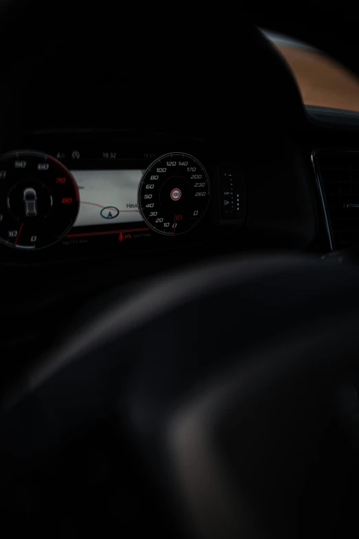 the car dashboard is dark and black in color