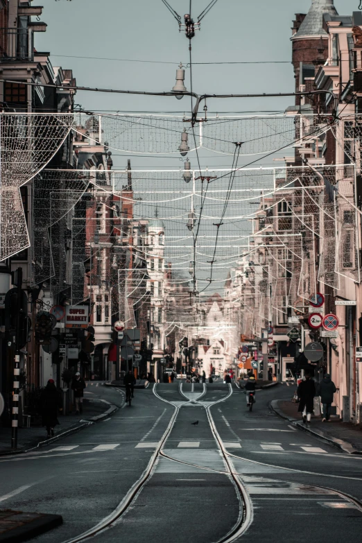 a long empty street with many buildings