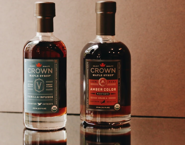 two bottles of crown single barrel bourbon