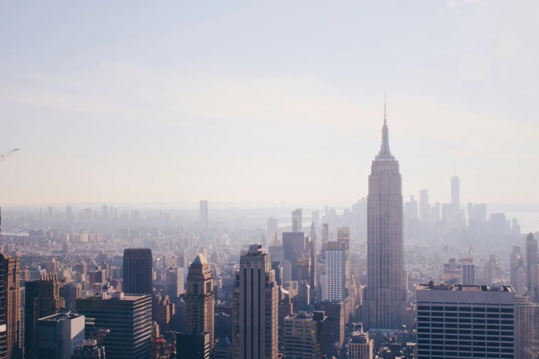 an aerial view of a big city with skyscrs