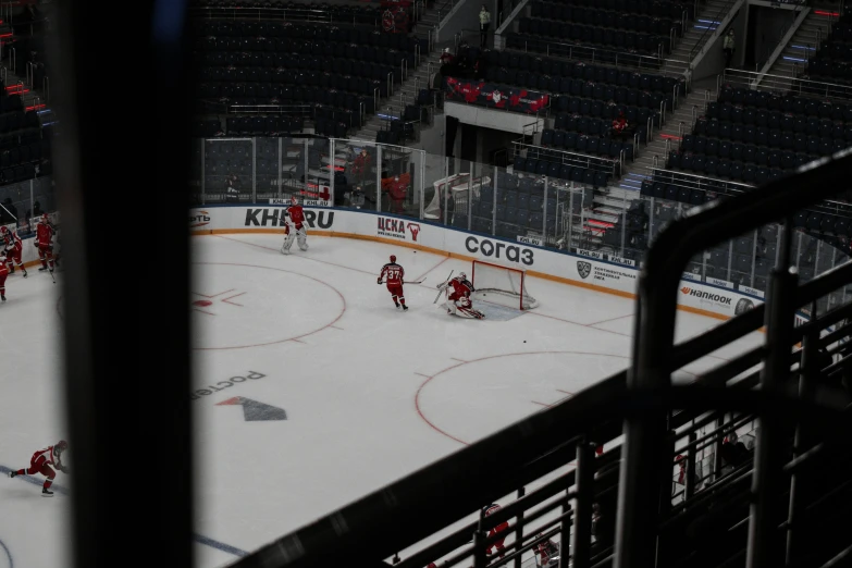 an indoor hockey stadium with empty seats