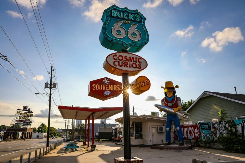 a variety of signs that are advertising different foods