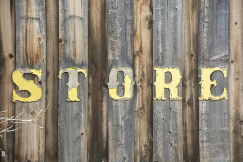 the word store is written on the wall of a shed