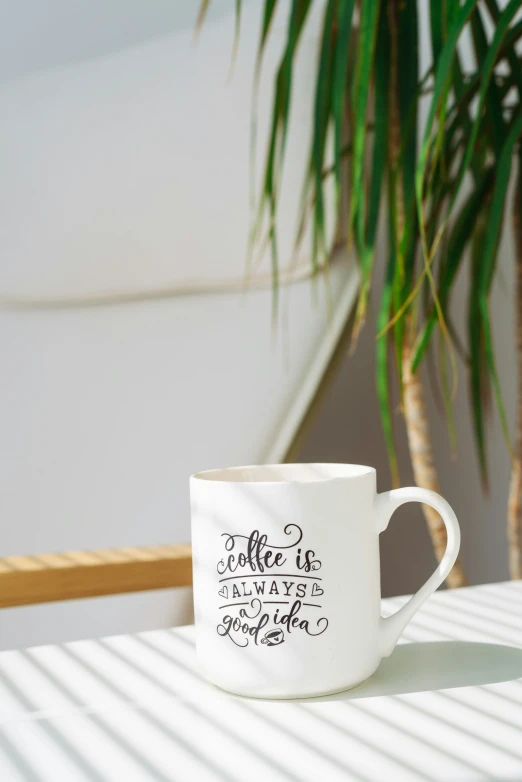 a white mug that says coffee is better with friends