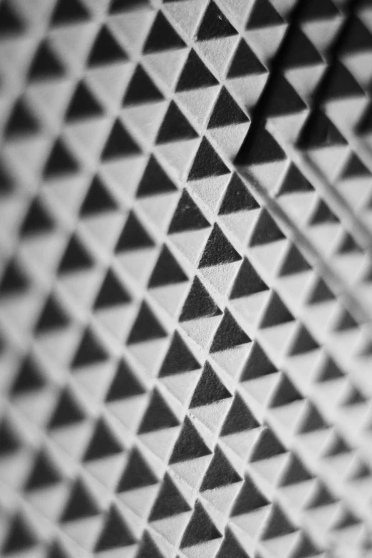 a close up po of triangles with shadows