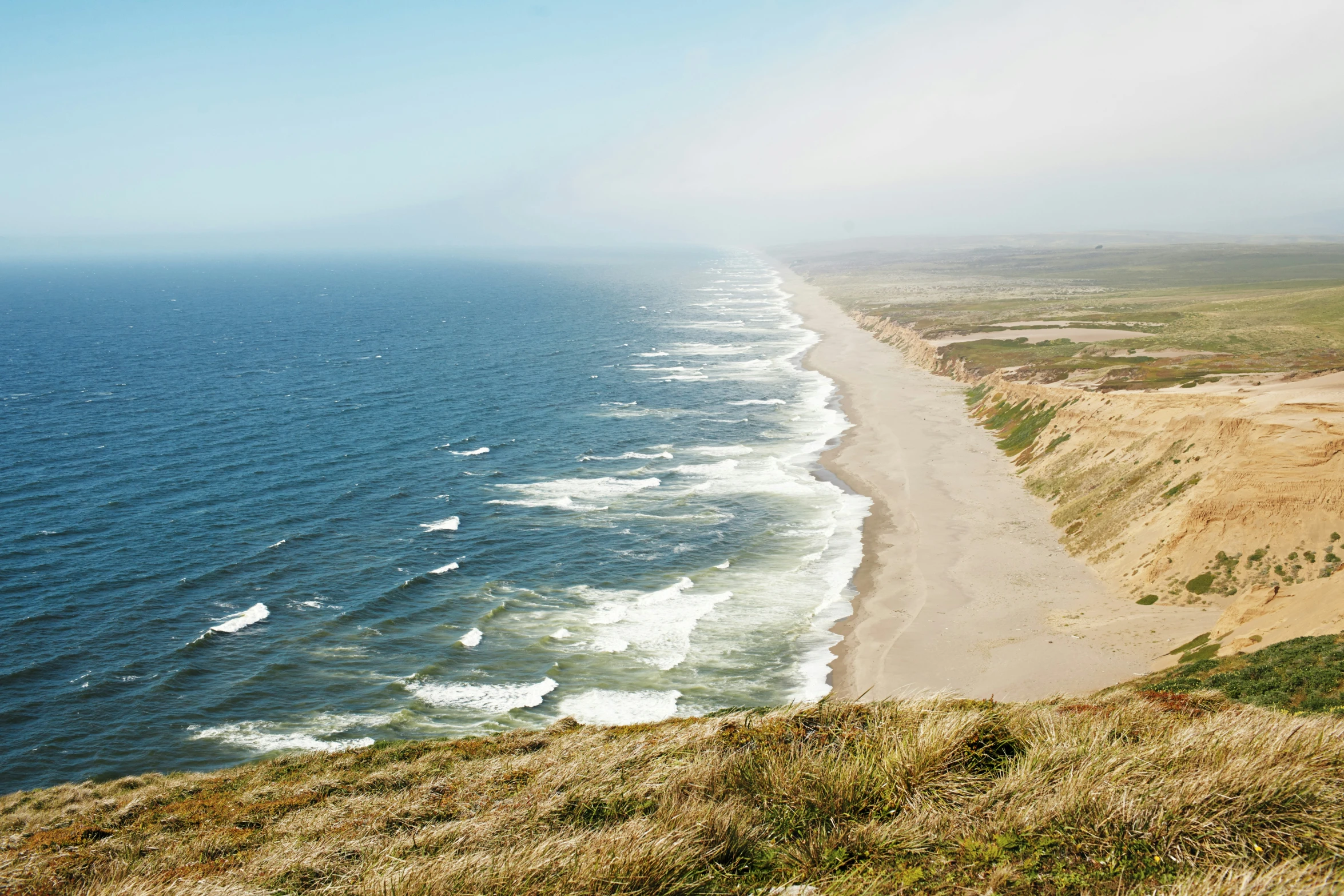 an ocean view looking down at the shore