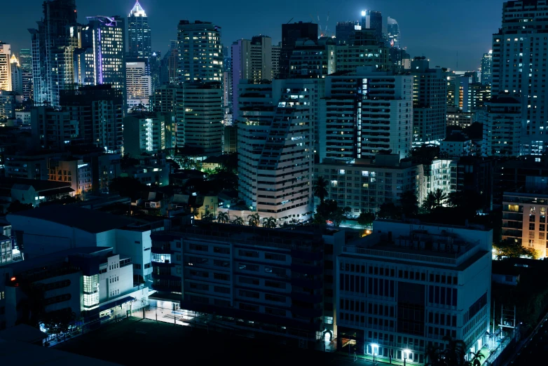 a cityscape at night time with lots of light