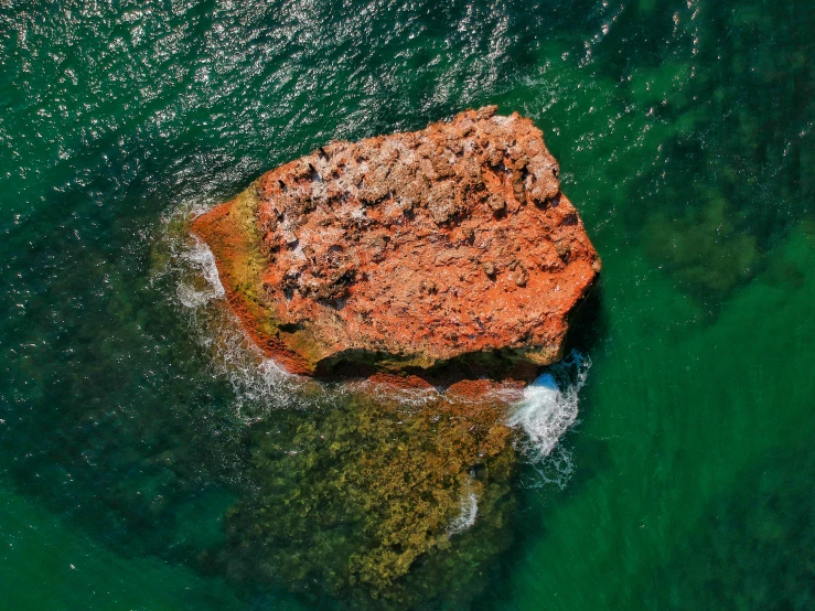 the water is green and clear and blue