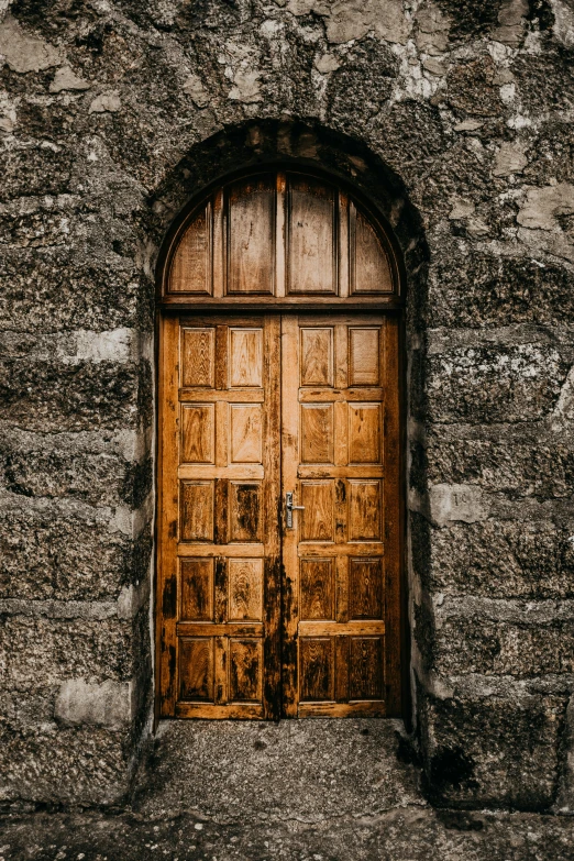 there is an old door that leads to another building