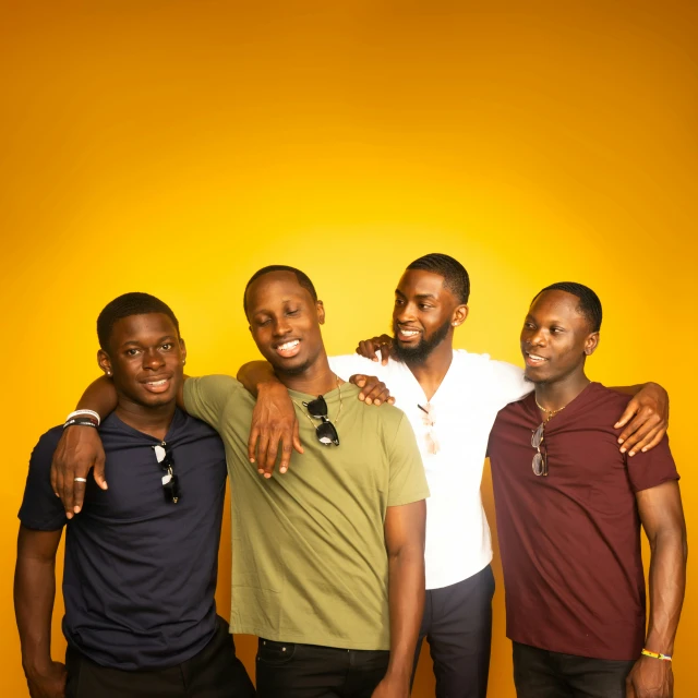 three men are posing for a picture together