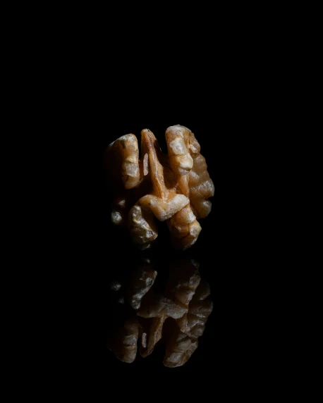 two small pieces of bread on a black background