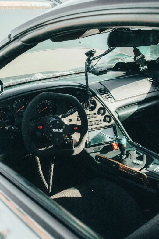 a close up of a dashboard and interior of a sports car