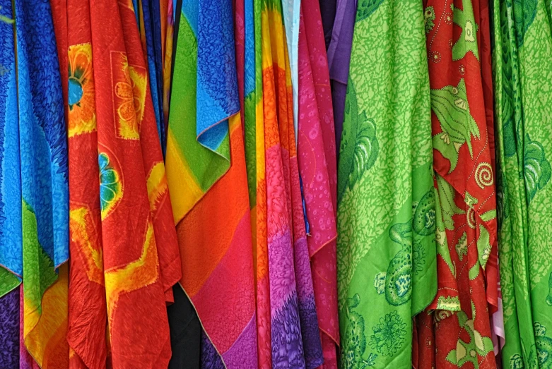 bright colored fabric hanging by the ends