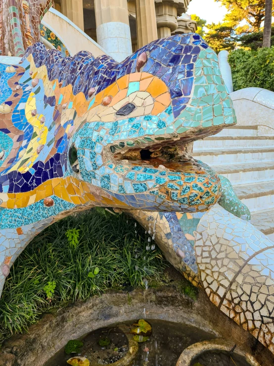 a large animal made of tiles and rocks