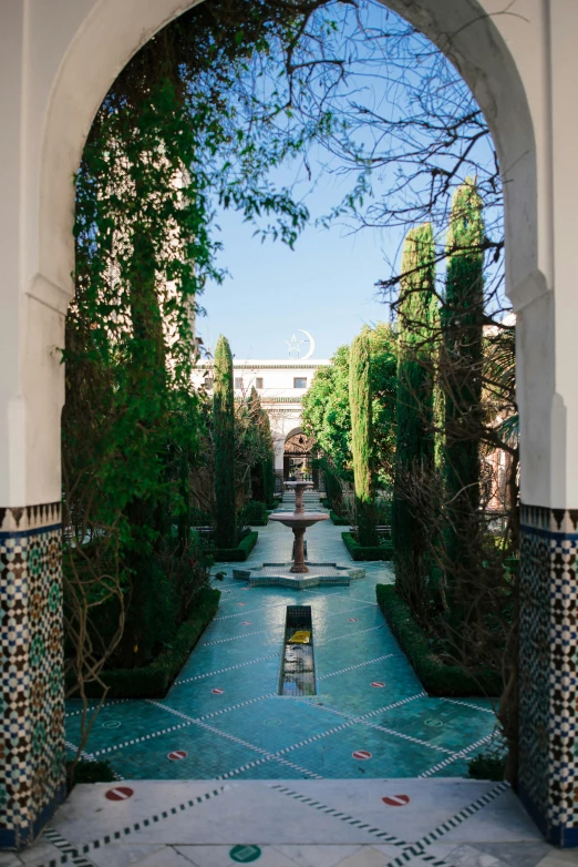 a very pretty outdoor garden with a nice fountain