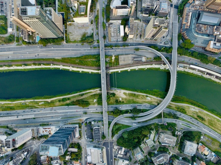 a top down view of an intersection with two streets and several traffic intersecting to one another