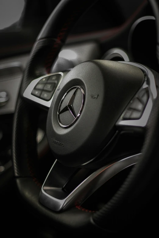 the steering wheel inside a car with a radio