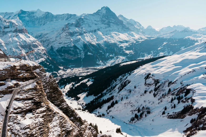 the skier is going down a very steep mountain