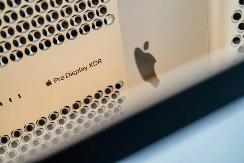 a apple product sitting on top of a metal tray