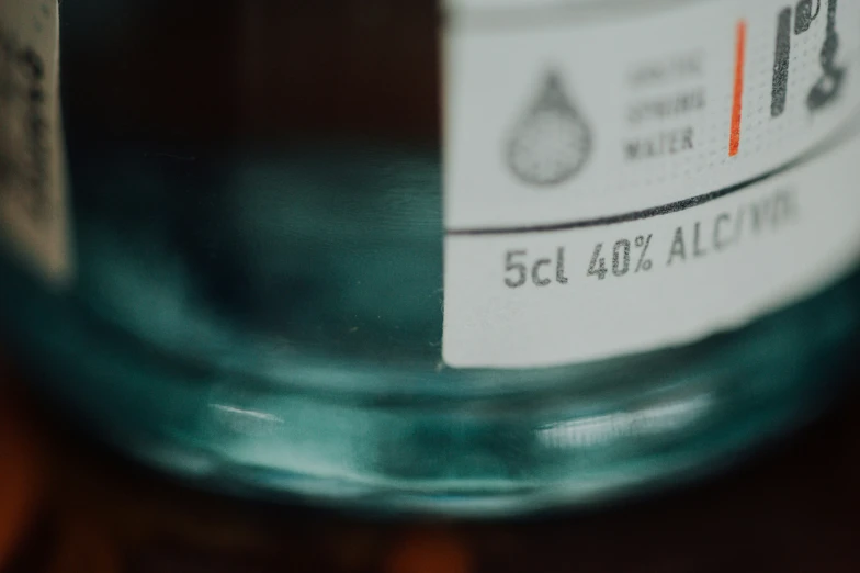 a label on the side of a jar of water