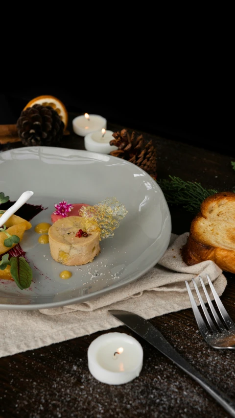 some bread and fruit are on the table