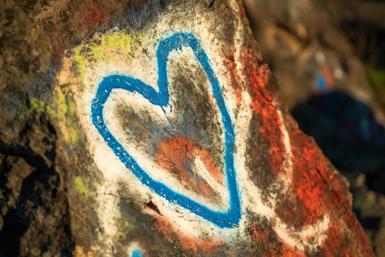 a rock that has a heart drawn on it