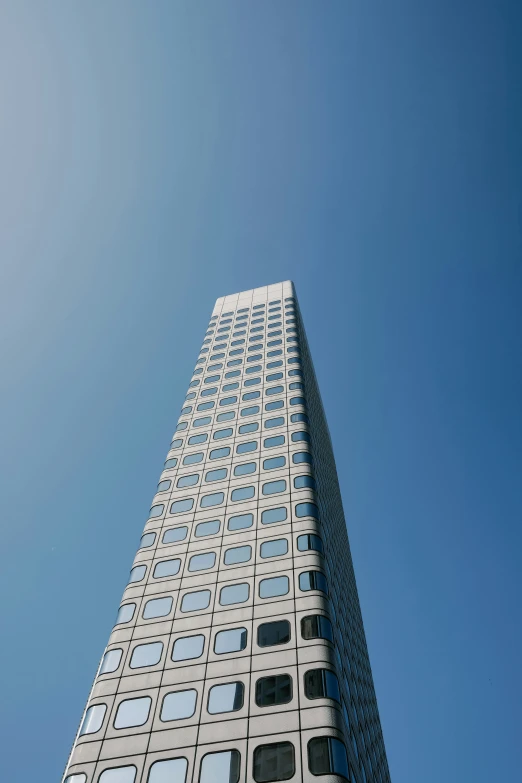 a tall building that is next to another building