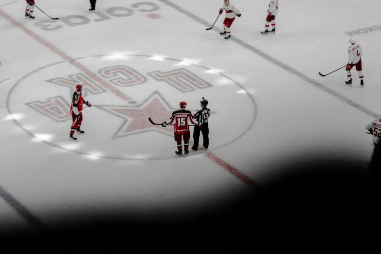 a hockey game is being played on the ice