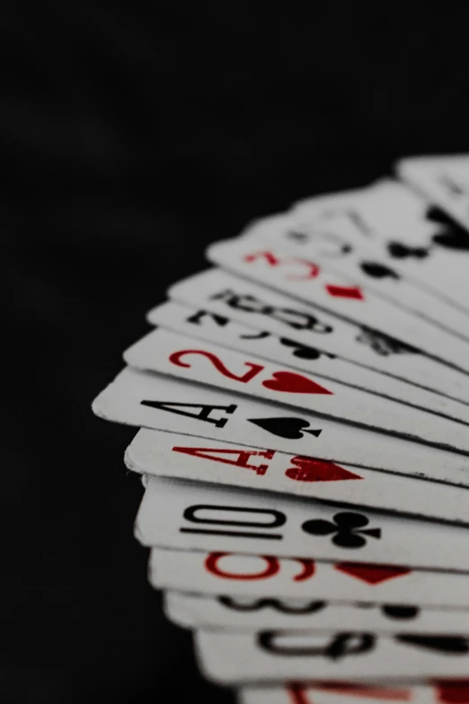 ten card poker cards arranged in a pyramid