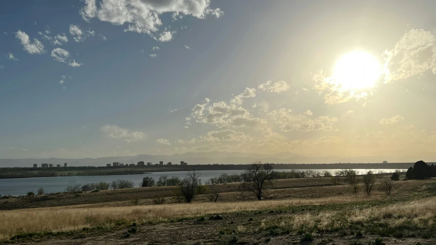 a landscape of a river running through the middle of the desert