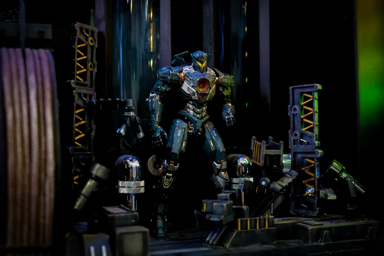 a giant robot is posed on top of a stage