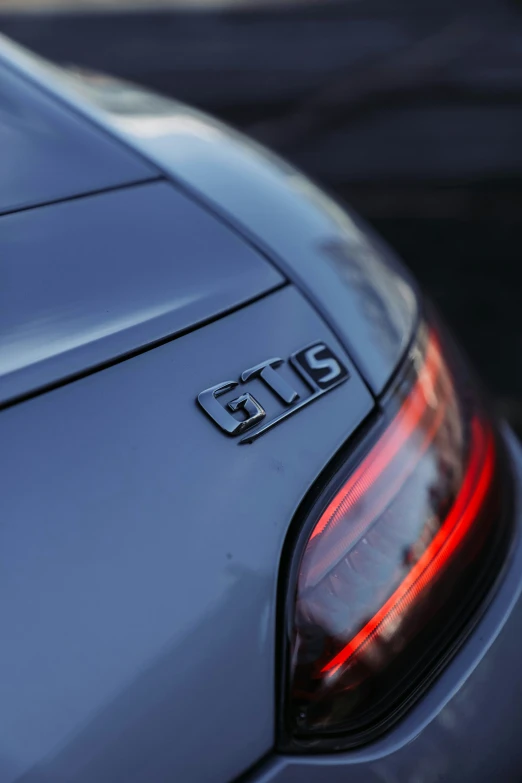 the emblem is displayed on the back of a car