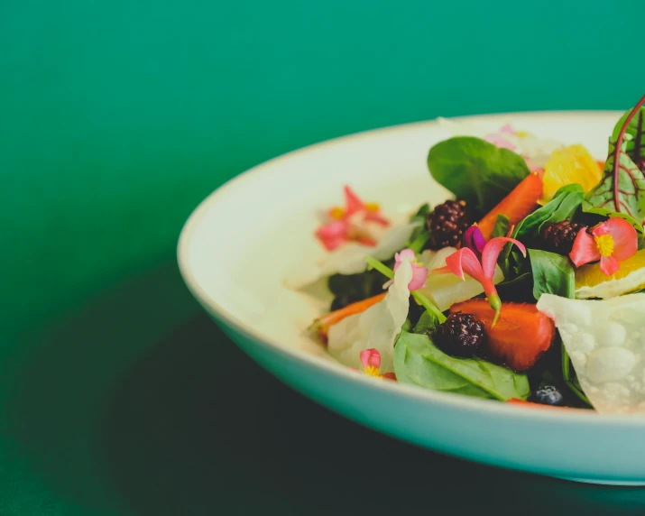 a close up of a salad in a bowl