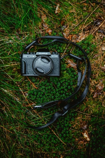 a camera in the grass with no one around
