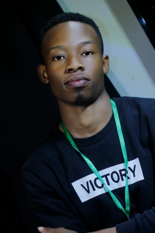 a close - up po of a young man, in the image taken on the camera