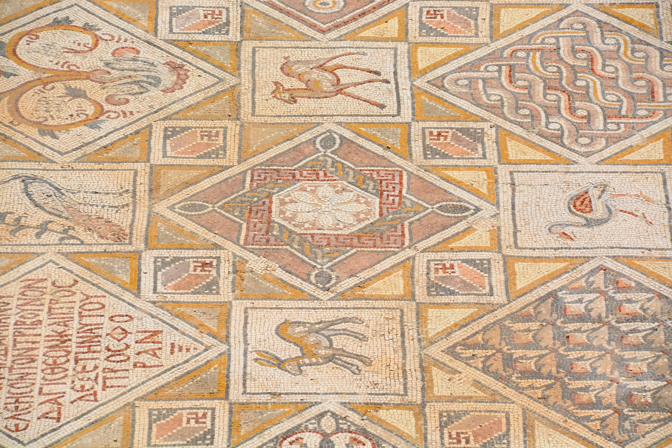 very ornate decorated floor with decorative letters and patterns