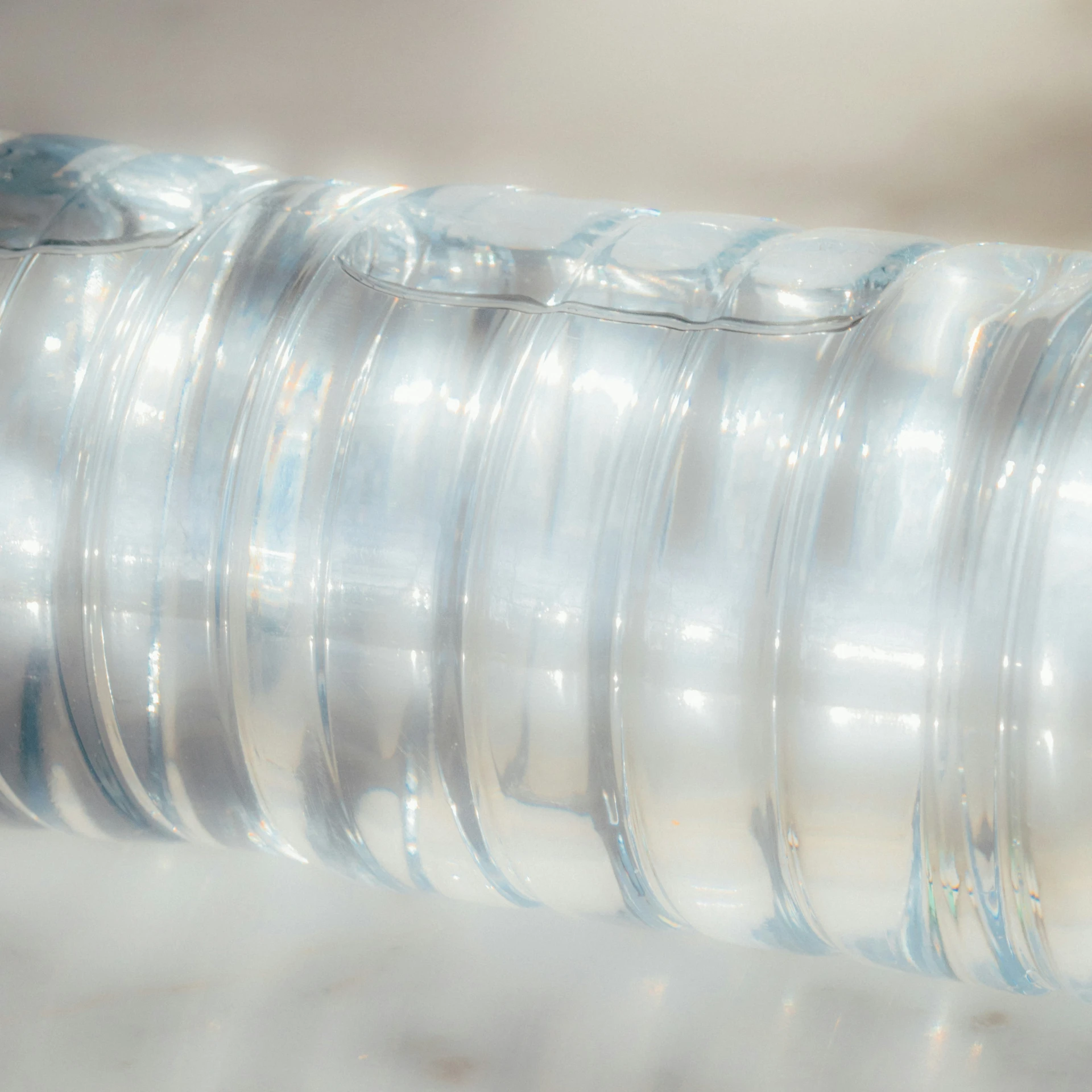 a shiny silver tube is on the table