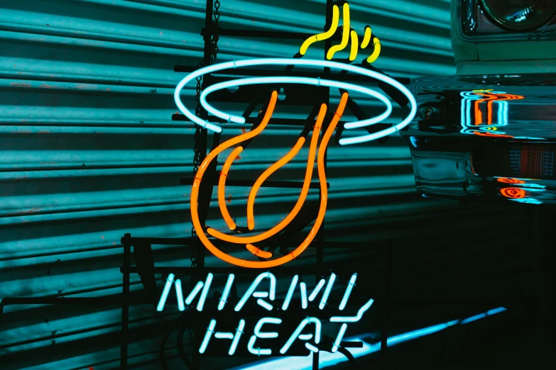 a neon sign for a miami heat restaurant