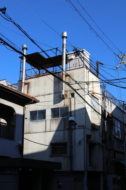 there is a building that has been covered by wires