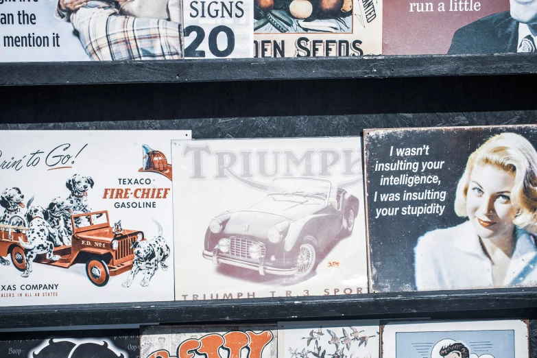 a display case with many different vintage business cards