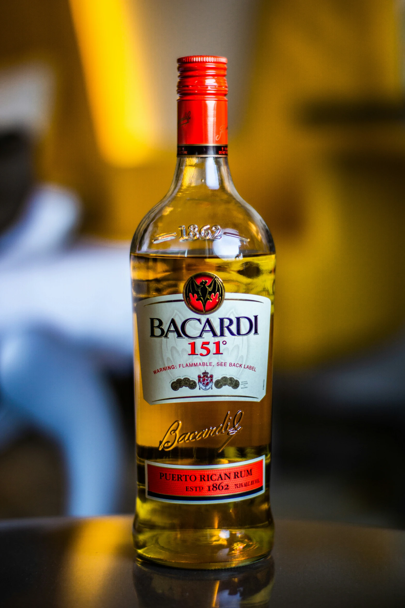 a bottle of bacardi wine on a table